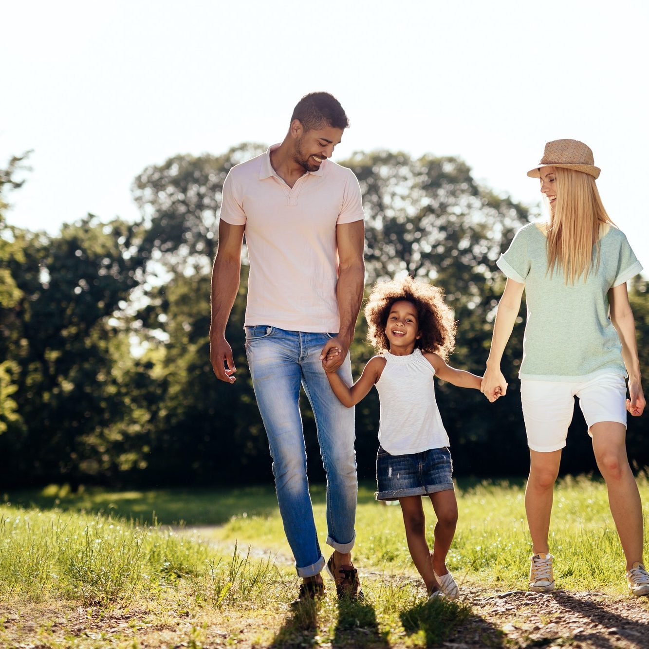 Playful faimly outdoors walking